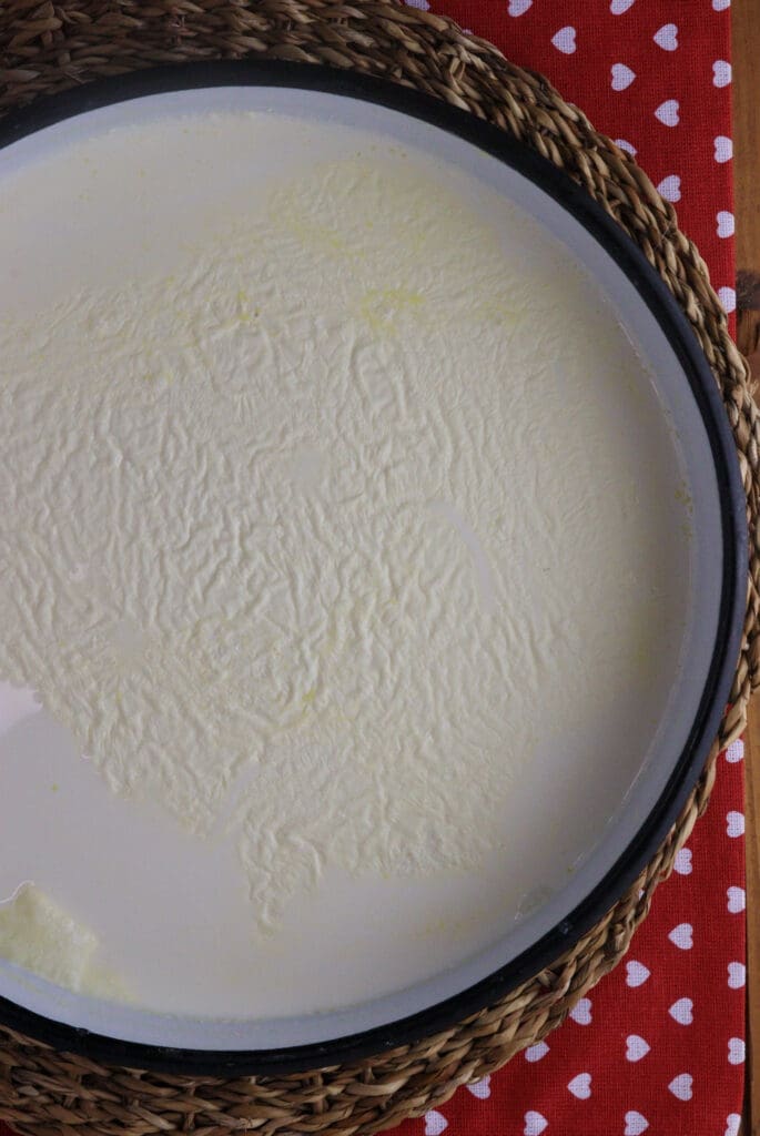 third kajmak layer formed on top of the milk